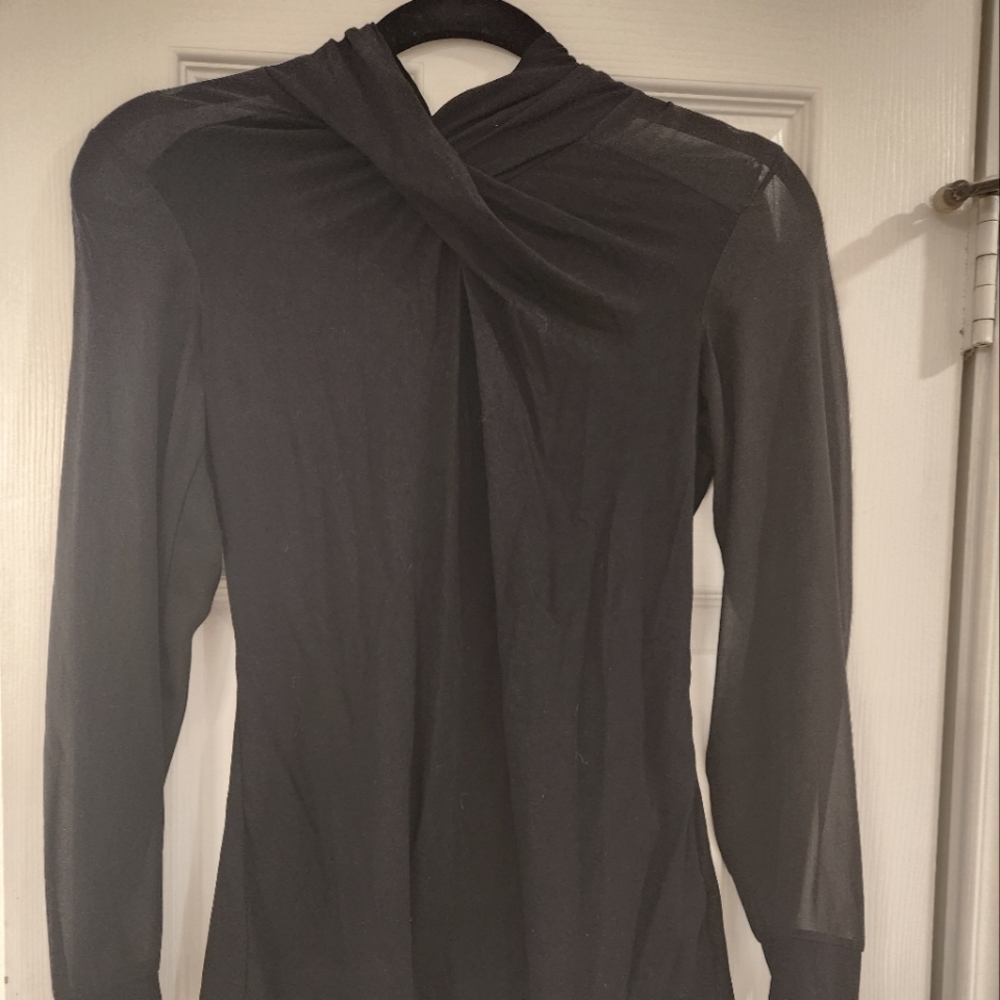 Black going out top